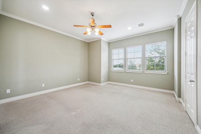 unfurnished bedroom featuring baseboards, ornamental molding, and light carpet