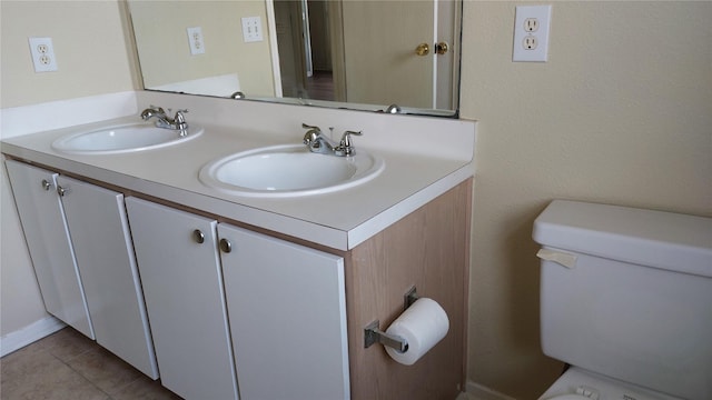 13411 Sarento Vlg, Sugar Land, TX 77498 - bathroom with tile patterned floors, toilet, double vanity, and a sink