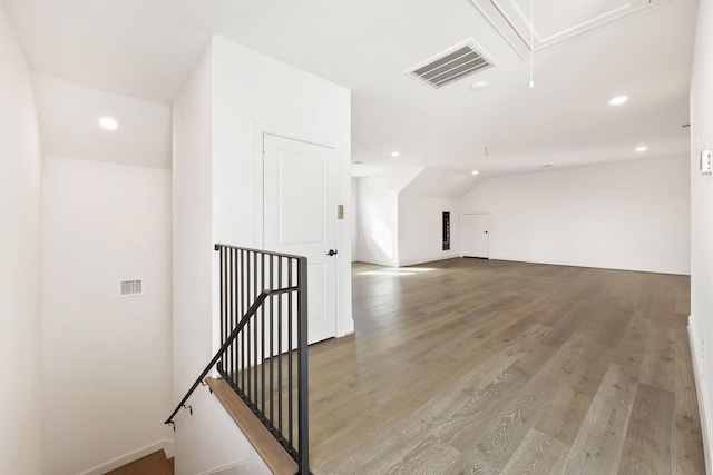 3714 Grennoch Ln, Houston, TX 77025 - bonus room featuring attic access, light wood-style floors, and recessed lighting