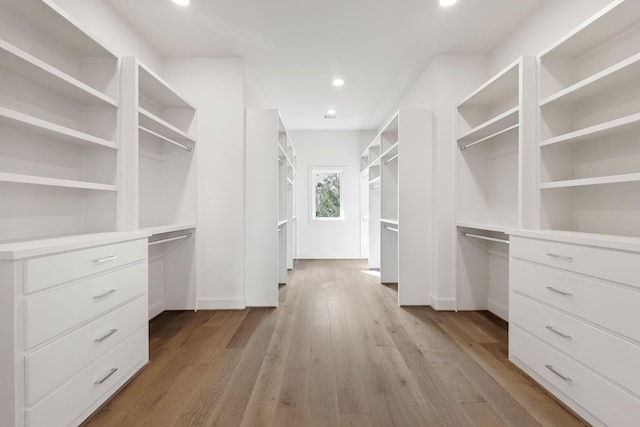 3714 Grennoch Ln, Houston, TX 77025 - walk in closet with wood finished floors