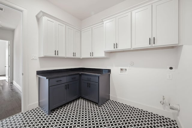 3714 Grennoch Ln, Houston, TX 77025 - washroom with hookup for a gas dryer, hookup for an electric dryer, cabinet space, and washer hookup