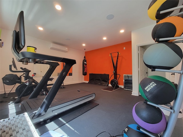 3714 Grennoch Ln, Houston, TX 77025 - exercise room featuring a wall unit AC and recessed lighting