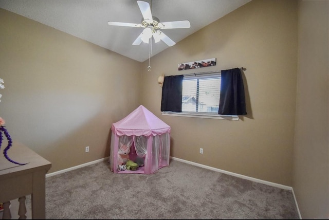 15 Murex St, Bay City, TX 77414 - recreation room with lofted ceiling, carpet flooring, a ceiling fan, and baseboards