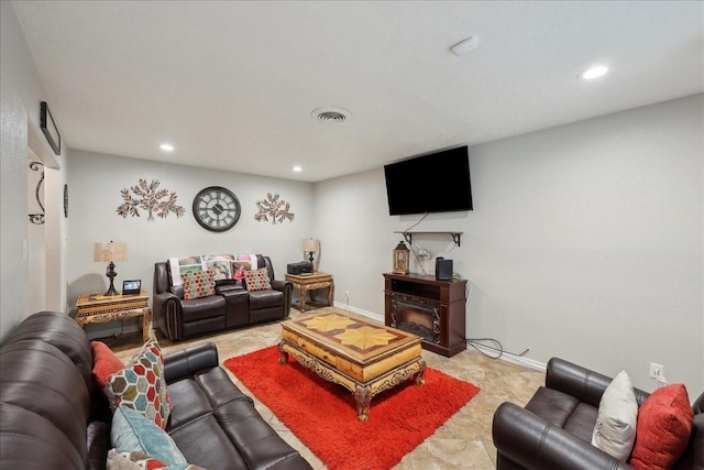 6360 Pansy Dr, Beaumont, TX 77706 - living area featuring a fireplace, visible vents, and recessed lighting