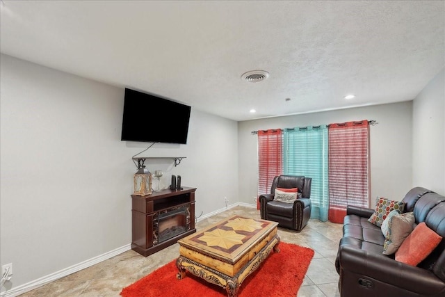 6360 Pansy Dr, Beaumont, TX 77706 - living room featuring visible vents, baseboards, and recessed lighting