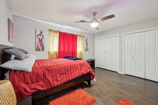 6360 Pansy Dr, Beaumont, TX 77706 - bedroom featuring dark wood-style flooring, ceiling fan, and two closets