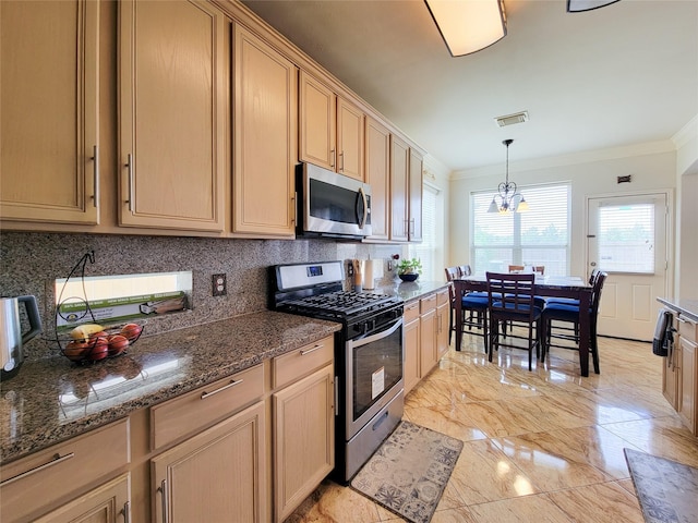 kitchen with visible vents, ornamental molding, backsplash, and appliances with stainless steel finishes