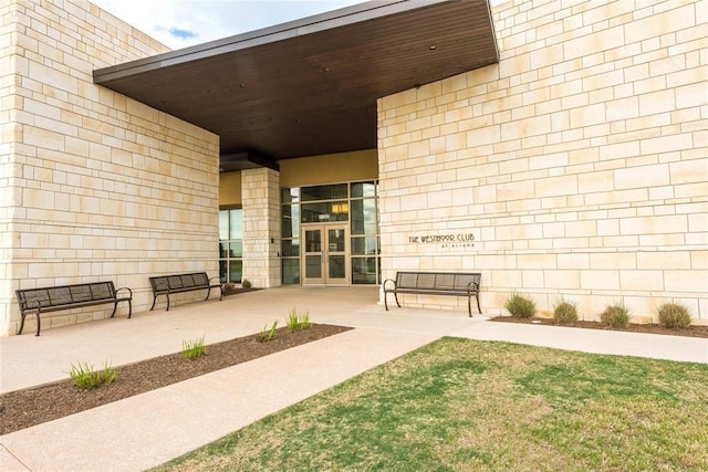 exterior space featuring concrete block siding