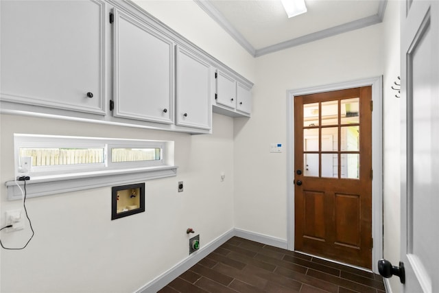 washroom with electric dryer hookup, gas dryer hookup, crown molding, washer hookup, and cabinet space