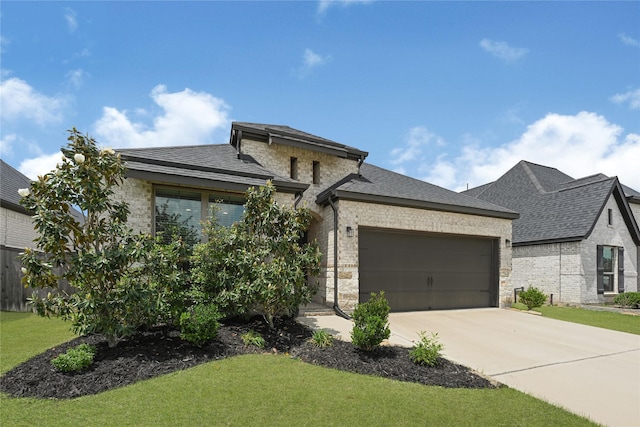 2146 Coyote Run Dr, Katy, TX 77494 - view of front of property with a garage, concrete driveway, roof with shingles, and brick siding