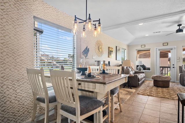 tiled dining room with baseboards, wallpapered walls, recessed lighting, visible vents, and ceiling fan with notable chandelier