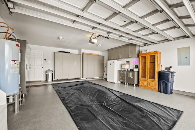garage featuring electric panel, electric water heater, freestanding refrigerator, and a garage door opener