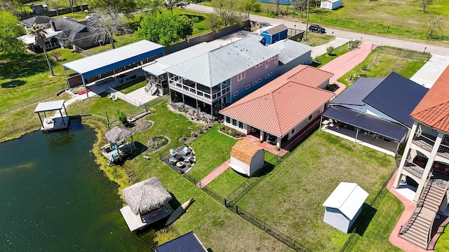 aerial view with a residential view and a water view