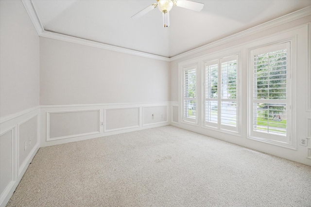 4404 Wendell St, Bellaire, TX 77401 - carpeted empty room with a decorative wall, wainscoting, ceiling fan, and crown molding