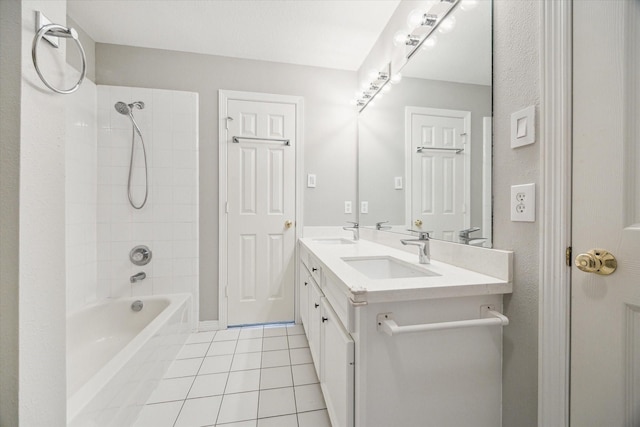 4404 Wendell St, Bellaire, TX 77401 - bathroom featuring tile patterned floors, washtub / shower combination, and double vanity