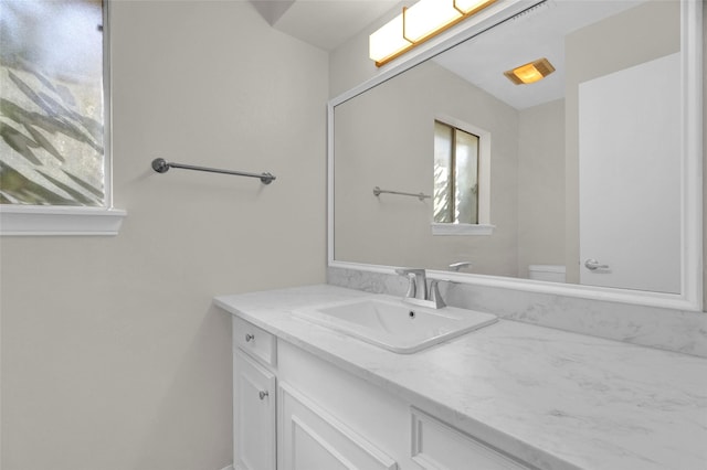 3142 La Quinta Dr, Missouri City, TX 77459 - bathroom featuring toilet, a healthy amount of sunlight, and vanity