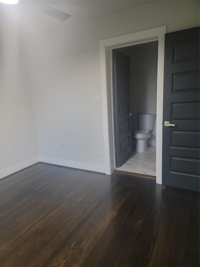 8424 Botany Ln, Houston, TX 77075 - spare room featuring baseboards and wood finished floors