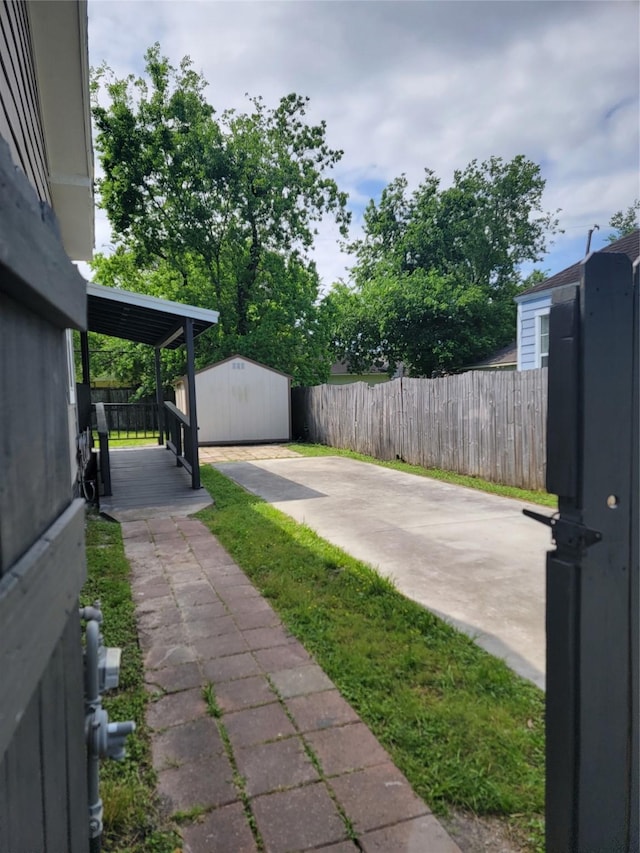 8424 Botany Ln, Houston, TX 77075 - view of yard featuring a storage shed, an outbuilding, and fence