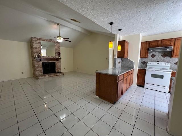 kitchen featuring light tile patterned floors, a ceiling fan, a peninsula, under cabinet range hood, and white electric range oven