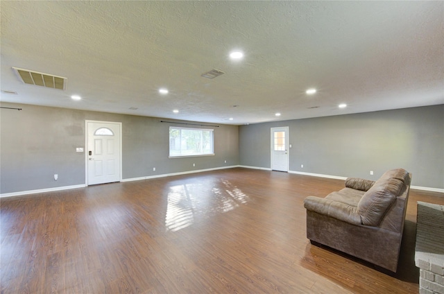 811 Strange Dr, Richmond, TX 77406 - living area featuring recessed lighting, visible vents, baseboards, and wood finished floors