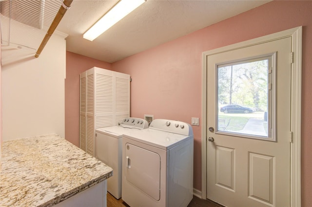 811 Strange Dr, Richmond, TX 77406 - laundry area featuring separate washer and dryer and laundry area