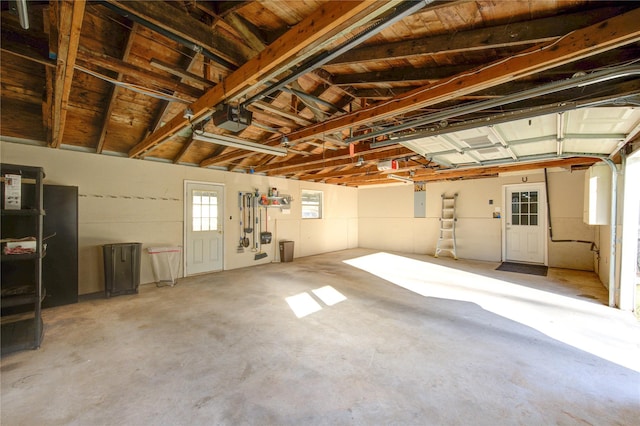 811 Strange Dr, Richmond, TX 77406 - garage with electric panel and a garage door opener