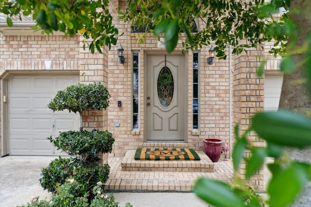 entrance to property featuring brick siding