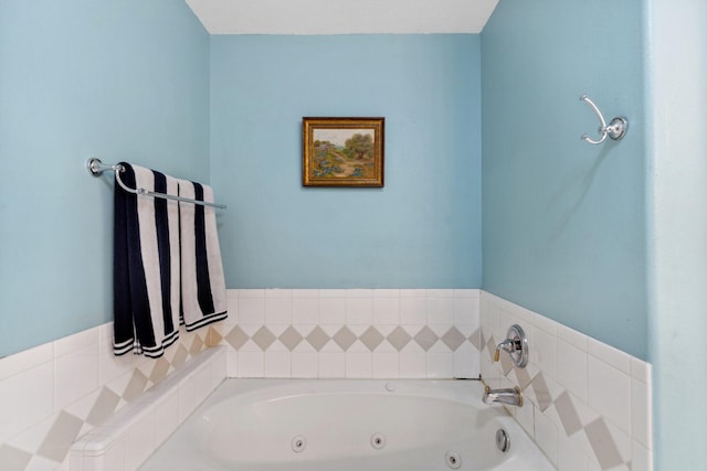 full bath featuring a whirlpool tub