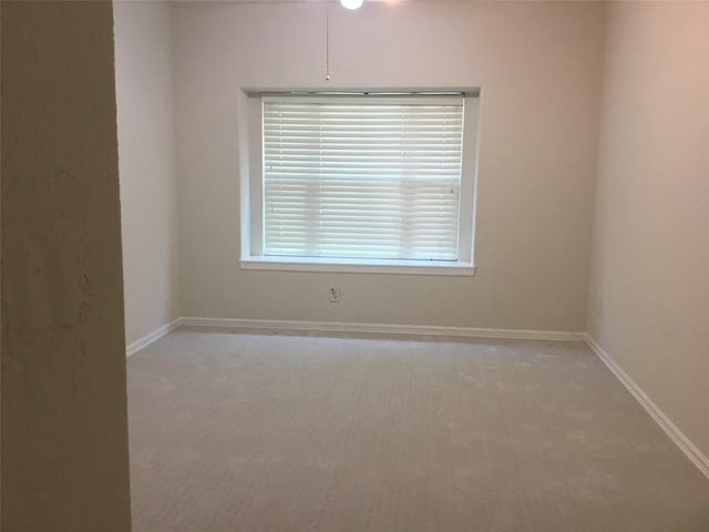 4810 N Pine Brook Way, Houston, TX 77059 - carpeted empty room with baseboards