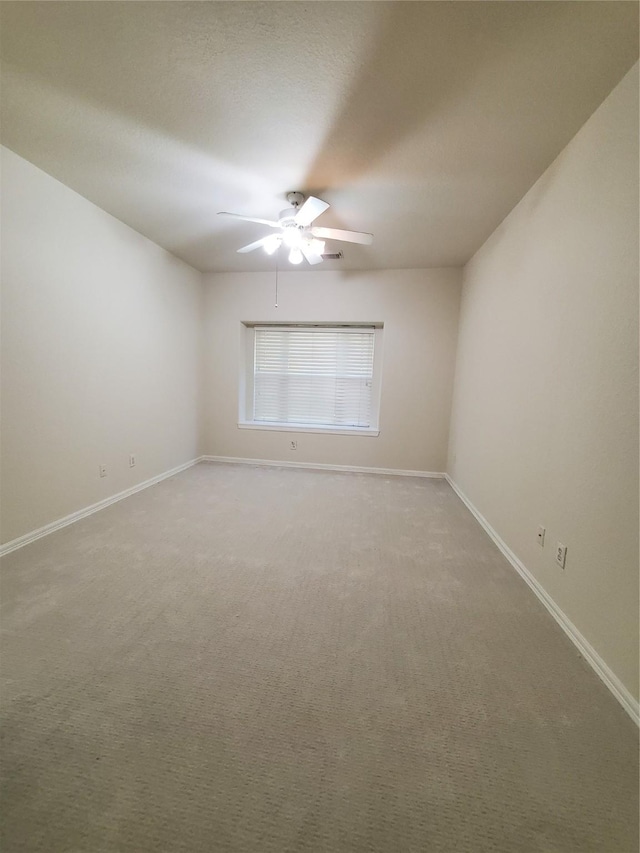 4810 N Pine Brook Way, Houston, TX 77059 - empty room featuring a ceiling fan, light carpet, and baseboards