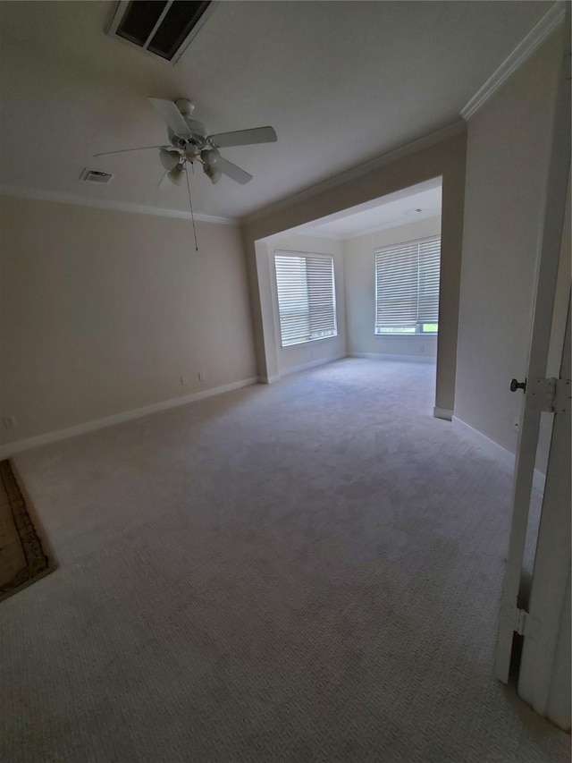 4810 N Pine Brook Way, Houston, TX 77059 - empty room with crown molding, light colored carpet, baseboards, and a ceiling fan