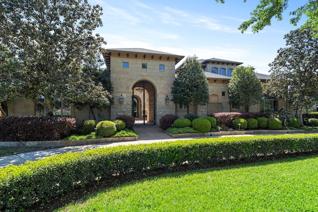 view of front of house with stone siding