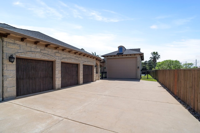 garage featuring fence