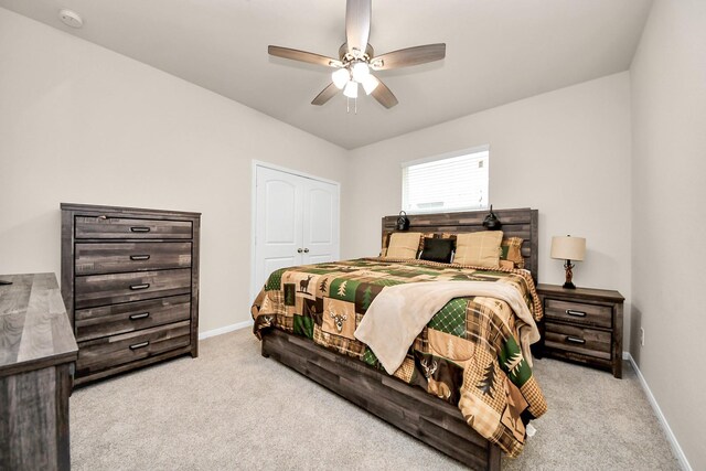 bedroom featuring carpet, a ceiling fan, and baseboards