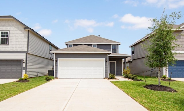 traditional home with driveway, a garage, central AC, and a front yard