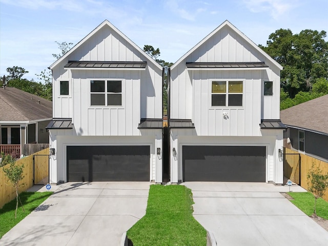 modern farmhouse with a standing seam roof and metal roof
