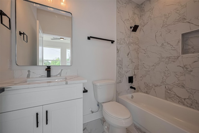 bathroom featuring toilet, bathtub / shower combination, marble finish floor, ceiling fan, and vanity