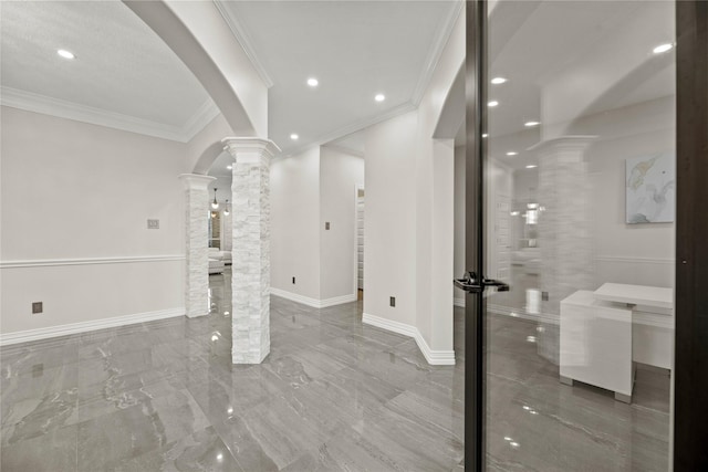 interior space featuring ornamental molding, recessed lighting, ornate columns, arched walkways, and marble finish floor