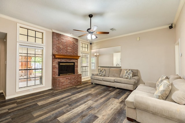 207 Audubon Woods Ct, Richwood, TX 77531 - living area featuring a ceiling fan, dark wood-style flooring, a brick fireplace, and a wealth of natural light