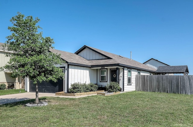 ranch-style house featuring concrete driveway, a front yard, fence, and an attached garage