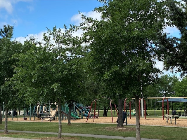 communal playground with a lawn