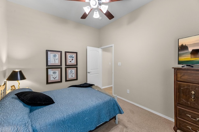 bedroom featuring carpet flooring, baseboards, and a ceiling fan