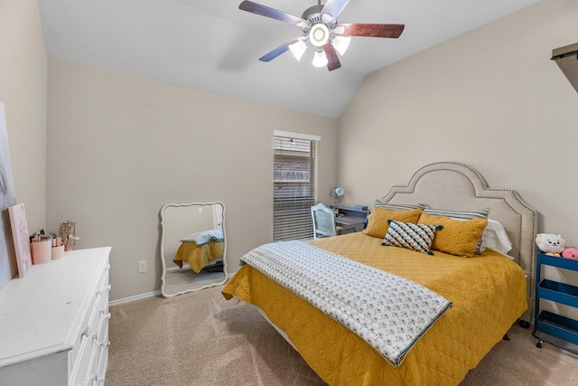 carpeted bedroom with ceiling fan, baseboards, and lofted ceiling
