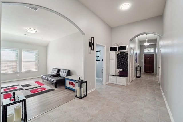 9507 Arrowhead Terrace Ln, Humble, TX 77396 - hall with arched walkways, visible vents, and baseboards