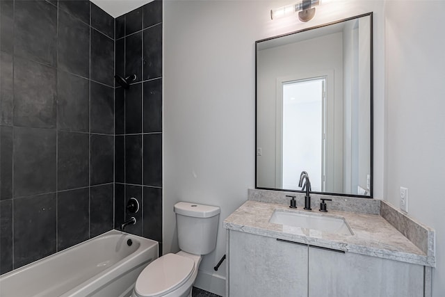 full bathroom with toilet, vanity, and shower / washtub combination
