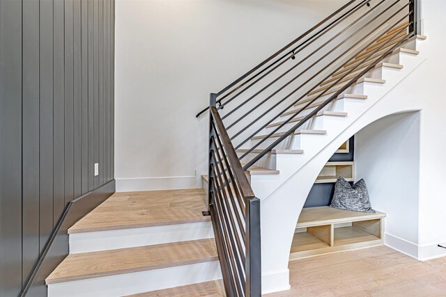 829 Alexander St, Houston, TX 77007 - stairway featuring baseboards and wood finished floors