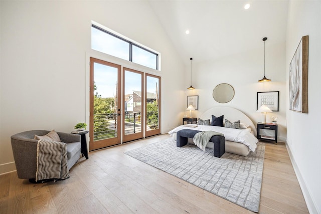 829 Alexander St, Houston, TX 77007 - bedroom with access to exterior, high vaulted ceiling, light wood-type flooring, french doors, and recessed lighting