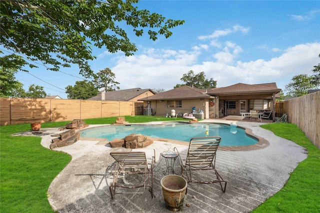 13918 Bretagne Dr, Houston, TX 77015 - view of pool with a fenced backyard, a patio area, a fenced in pool, and a lawn