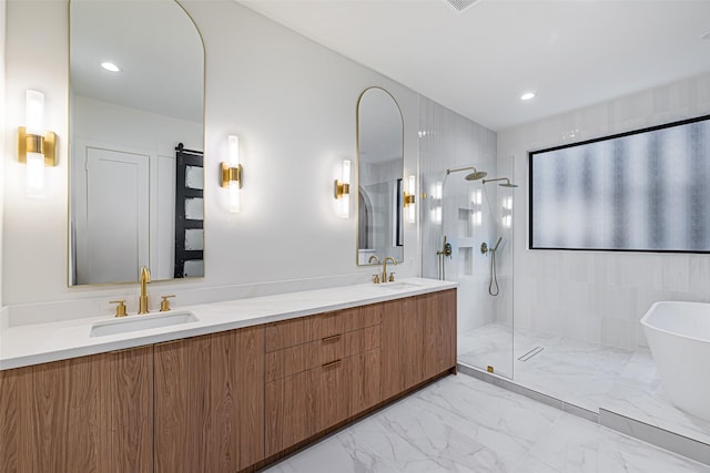 full bathroom with a walk in shower, marble finish floor, and a sink