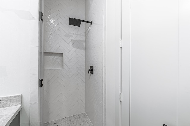 full bath featuring vanity and a stall shower